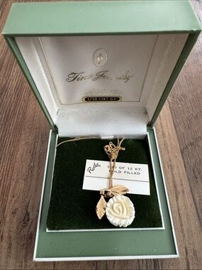 Gold-Tone Necklace with Cream Rose Pendant and Leaf Accents